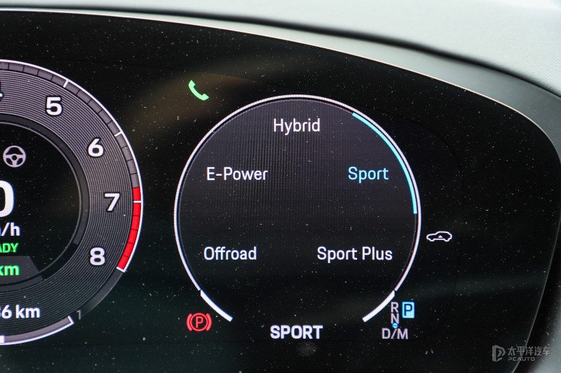 中控台驾驶模式选择旋钮特写，展示E-Power、Hybrid等模式图标